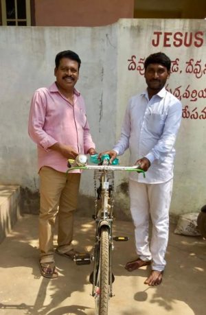 Prem Gave Bicycle to Pastor Yesupadem and is Helping Him Rebuild His Church After Flooding