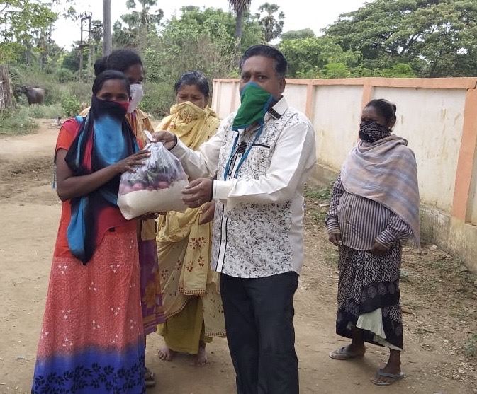 Prem Distributing Food in Tribal Village